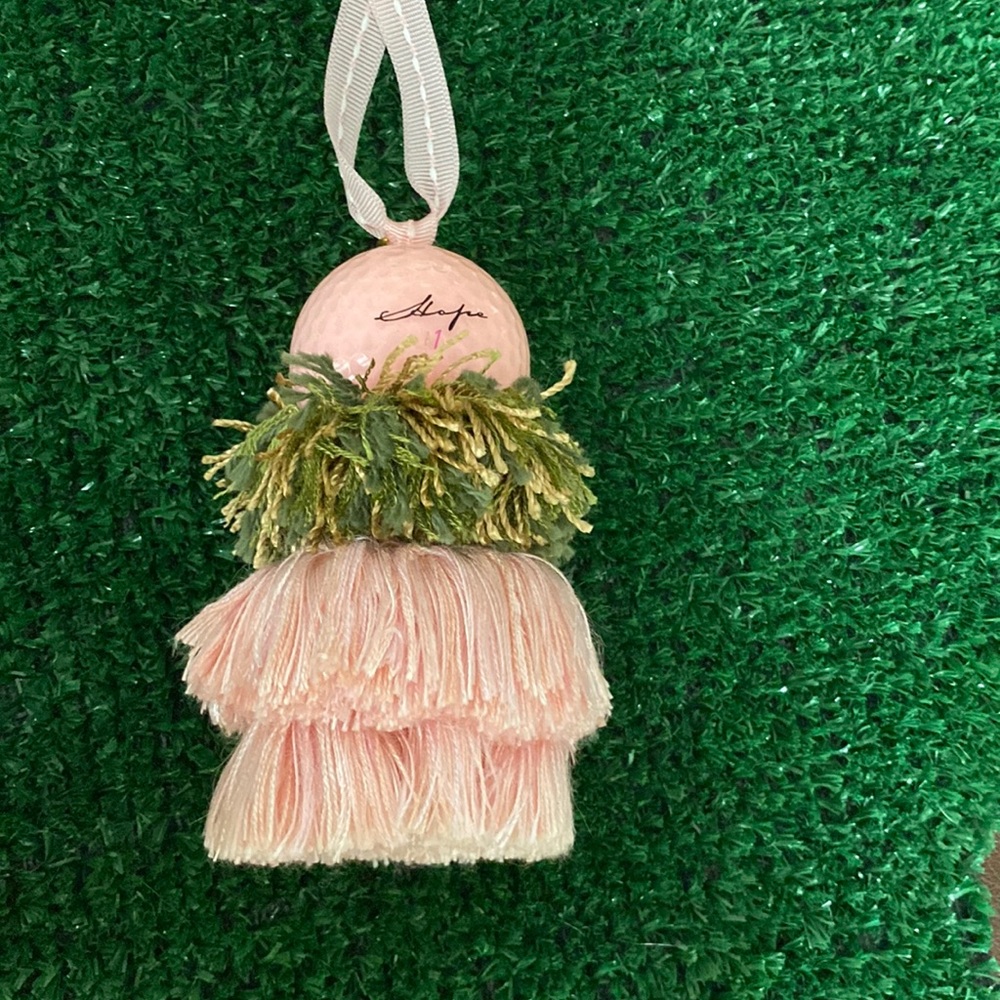 Golf ball tassel/ breast cancer awareness.
